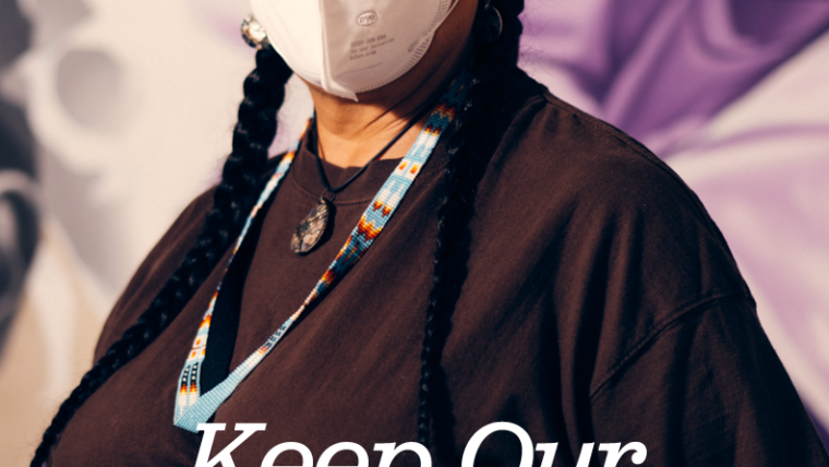 A Native frontline worker stands, masked, behind text: Keep Our Communities Healthy